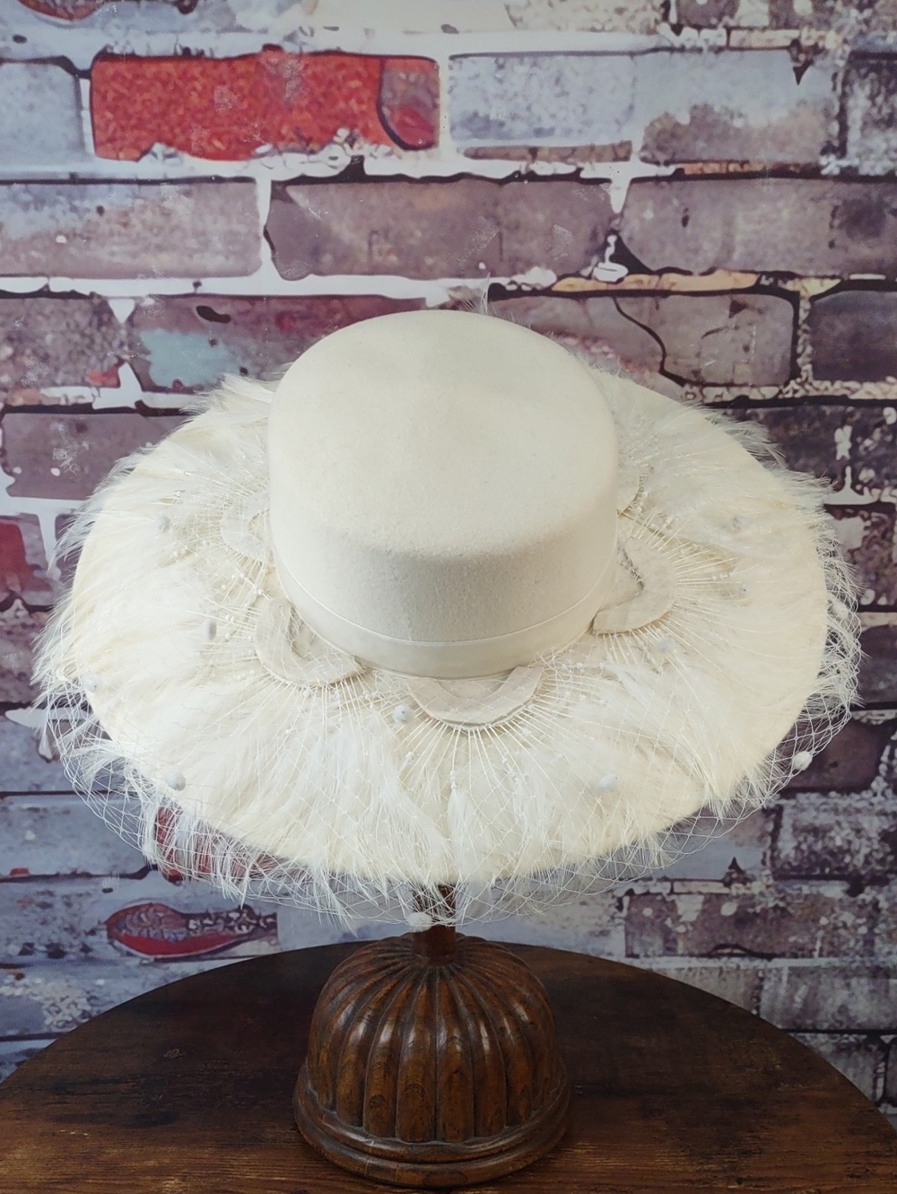 Elegant Ivory Feather Brim Hat